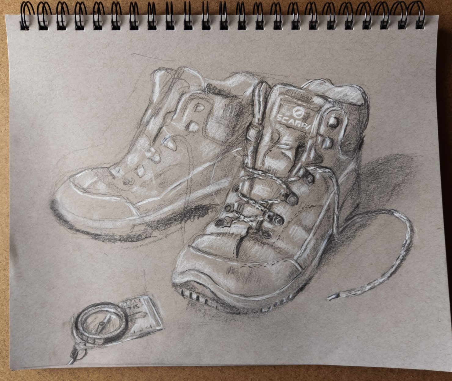 drawing of walking boots and compass during lockdown. A reminder of the artist's abandoned walking holiday because of lockdown