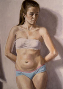 painting of model leaning against wall