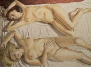 two nude women posing on floor