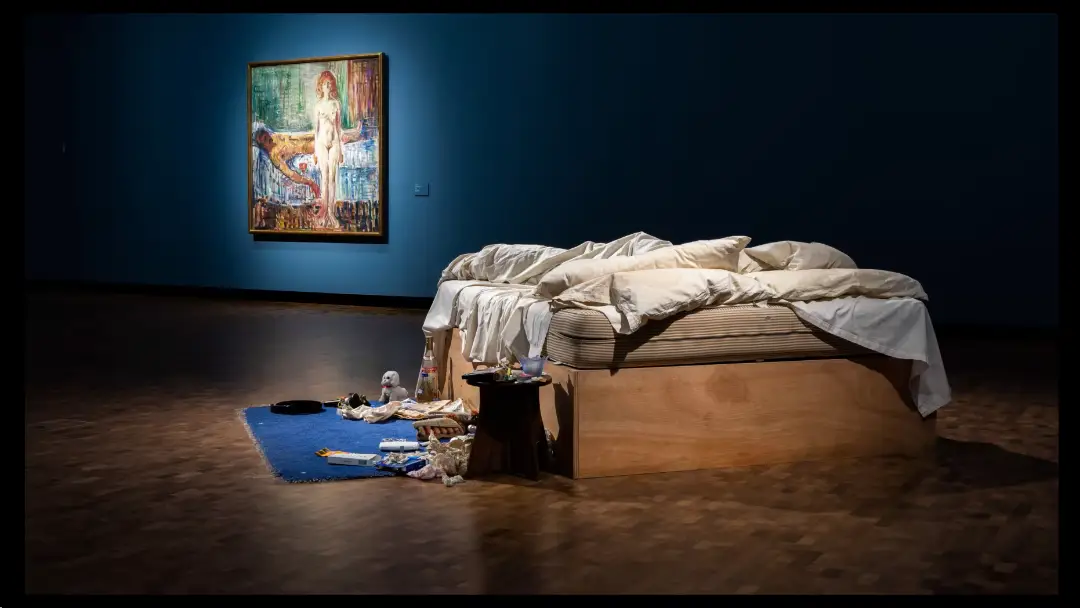 tracey emin's bed next to a painting by edvard munch